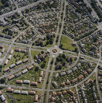 Oblique aerial view centred on the Greendykes Road and the church, taken from the WNW.