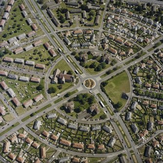 Oblique aerial view centred on the Greendykes Road and the church, taken from the WSW.