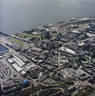 General oblique aerial view of Dundee centred on the cathedral and Seagate, taken from the NNE.