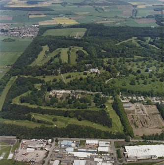 Oblique aerial view of Camperdown Park centred on the country house with the walled garden and glasshouses adjacent, taken from the S.
