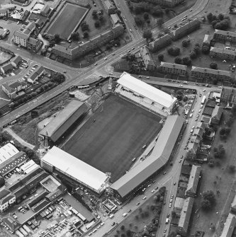Dundee, Tannadice Street, Dens Park, oblique aerial view, taken from the NE, centred on Dens Park football ground (under development).