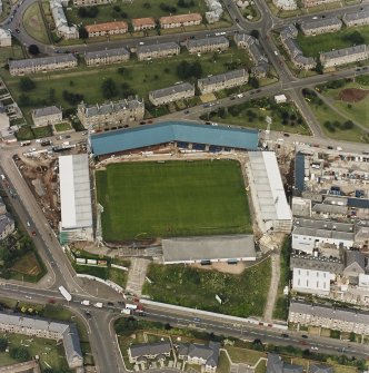 Dundee, Tannadice Street, Dens Park, oblique aerial view, taken from the SSW, centred on Dens Park football ground (under development).