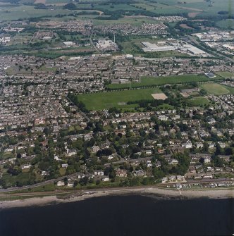 General oblique aerial view of Dundee centred on Fairfield Road and Dawson Park, taken from the S.