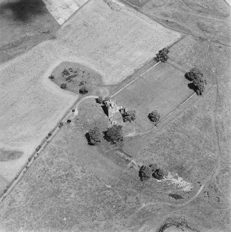 Oblique aerial view of Balvaird Castle with Balvaird farmstead, taken from the SSW.