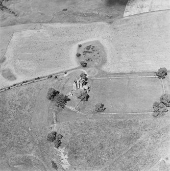 Oblique aerial view of Balvaird Castle with Balvaird farmstead, taken from the SSE.