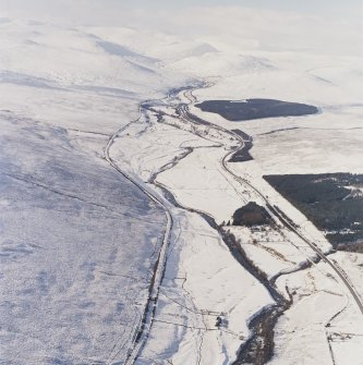 General oblique aerial view of the A9 road looking along Glen Garry towards the Grampian Mountains, taken from the SE.