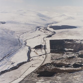 General oblique aerial view of the A9 road looking along Glen Garry towards the Grampian Mountains, taken from the ESE.