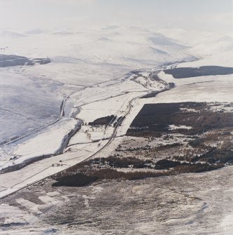 General oblique aerial view of the A9 road looking along Glen Garry towards the Grampian Mountains, taken from the E.