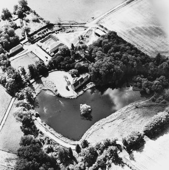 Ecclesiamagirdle, oblique aerial view, taken from the N, centred on the remains of the chapel and the Laird's House and dovecot.