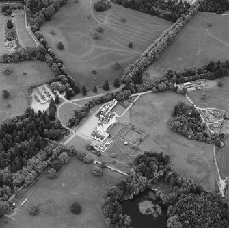Oblique aerial view of Blair Castle centred on the country house and garden, taken from the WNW.