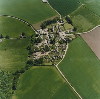 Oblique aerial view centred on the village of Fowlis Wester, taken from the W.