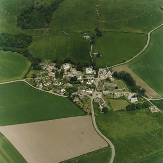 Oblique aerial view centred on the village of Fowlis Wester, taken from the SSE.