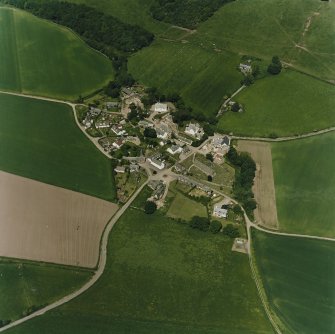 Oblique aerial view centred on the village of Fowlis Wester, taken from the SE.