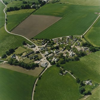 Oblique aerial view centred on the village of Fowlis Wester, taken from the NE.