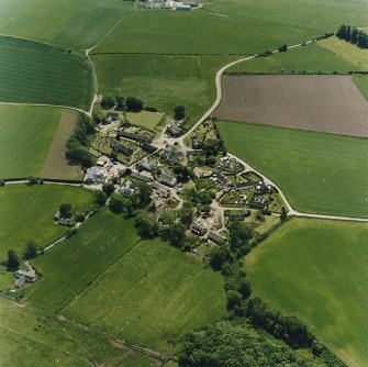 Oblique aerial view centred on the village of Fowlis Wester, taken from the NW.