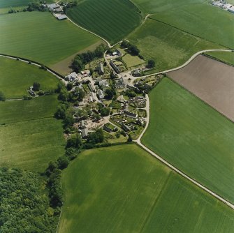 Oblique aerial view centred on the village of Fowlis Wester, taken from the WNW.