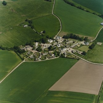 Oblique aerial view centred on the village of Fowlis Wester, taken from the SSW.