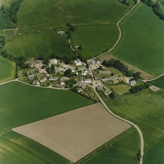 Oblique aerial view centred on the village of Fowlis Wester, taken from the S.