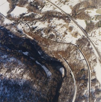 Oblique aerial view centred on the railway viaduct and tunnel, taken from the S.