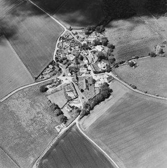 Oblique aerial view centred on the village of Fowlis Wester, taken from the ESE.