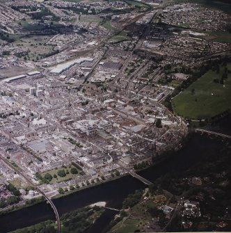 Perth town centre, oblique aerial view, taken from the SE, centred on the town centre and three bridges over the River Tay.