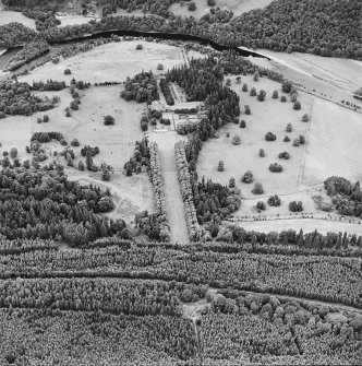 Oblique aerial view of Murthly Castle centred on the castle, chapel and walled garden, taken from the SSE.