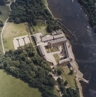 Oblique aerial view centred on the mill, taken from the WNW.