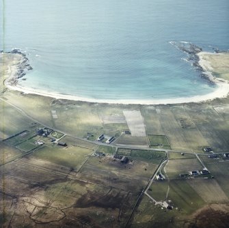 General oblique aerial view looking towards the bay of Culla across the farmhouse, the farmstead, the farmsteading and the burial enclosures adjacent, taken from the ESE