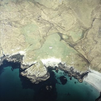 Oblique aerial view centred on the remains of the township, taken from the SE.