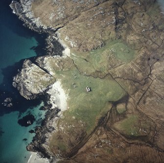 Oblique aerial view centred on the remains of the township, taken from the NE.