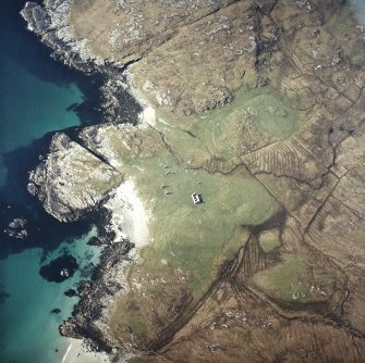 Oblique aerial view centred on the remains of the township, taken from the NE.