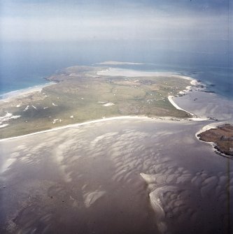 General olique aerial view looking across Eolaigearraidh towards the island of Fiariadh, taken from the SSE.