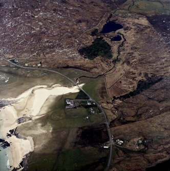 Oblique aerial view centred on the lodge and house, taken from the SW.