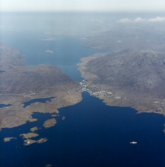 General oblique aerial view looking towards the village of Tarbet and Loch a Siar beyond, taken from the SE.