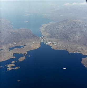 General oblique aerial view looking towards the village of Tarbet and Loch a Siar beyond, taken from the SE.