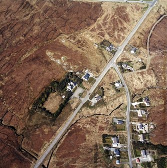 Oblique aerial view centred on part of the crofting township, taken from the SE.
