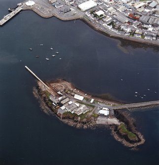 Oblique aerial view centred on Eilean na Gobhaih and the pier, taken from the S.