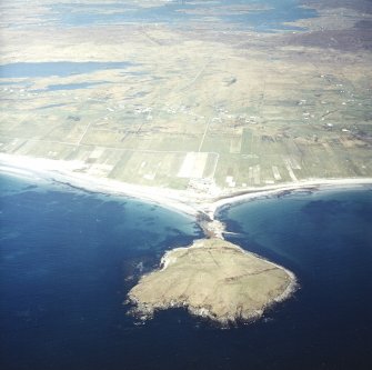 General oblique aerial view looking over Orosay looking across North Boisdale to Lochboisdale in the distance, taken from the WSW.