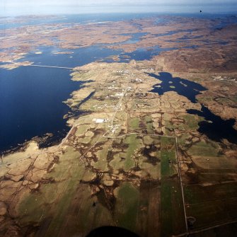 Oblique aerial view centred on the township, taken from the NW.