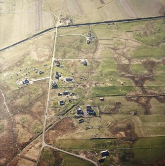 Oblique aerial view centred on the remains of the township, taken from the ESE.