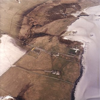 Oblique aerial view centred on the country house and the remains of the house, farmstead and walled garden, taken from the SW.