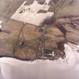 Oblique aerial view centred on the country house and the remains of the house, farmstead and walled garden, taken from the SE.