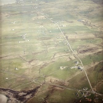 General oblique aerial view centred on the crofting townships and the remains of the buildings, taken from the W.