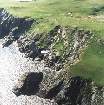 General oblique aerial view centred on the remains of the steatite workings, taken from the E.