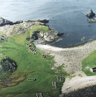 Oblique aerial view centred on the remains of the fishing station, taken from the SSE.