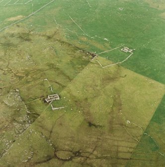 Oblique aerial view centred on the remains of the township and head-dyke, taken from the SW.
