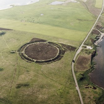 Aerial view of Orkney, Ring of Brodgar, henge and stone circle, taken from the SE.  Also visible are cairns and the 'Comet Stone'.