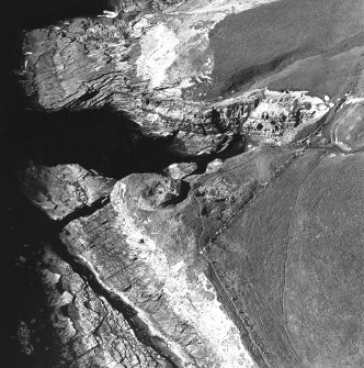 Aerial view of Orkney, Yesnaby taken from the SW, of the Broch of Borwick.  An area of rig-and-furrow cultivation is also visible.