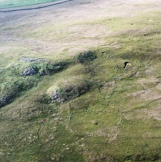 Oblique aerial view of the remains of the field-system and structure, taken from the S.
