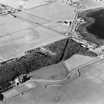 Oblique aerial view of Orkney, Aerial view of Orkney, Shapinsay, Balfour Castle, Balfour village and harbour taken from the SW.  Also visible is the former Balfour village gasometer